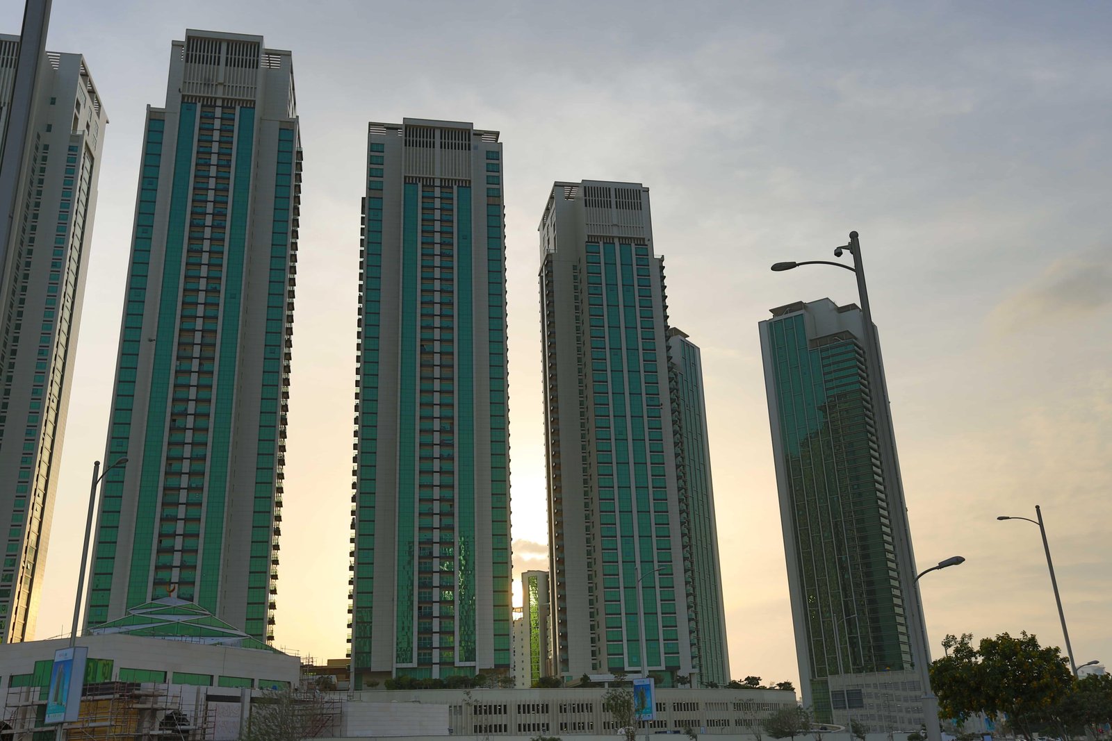 Burooj Views exterior in Marina Square, Abu Dhabi, showcasing the 45‑storey luxury residential tower with panoramic waterfront and skyline views.